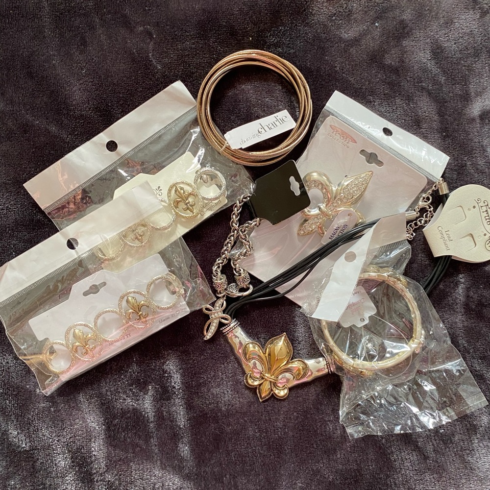 Fleur de lis costume jewelry all new with tags or in bags